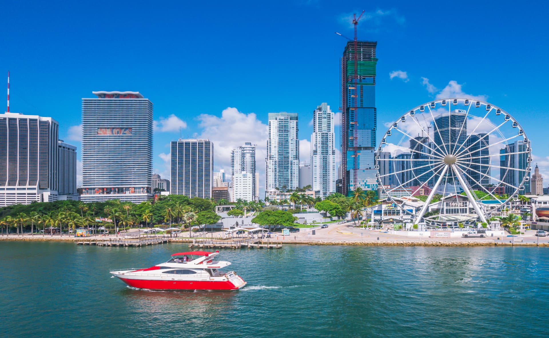 Sunvibe Yacht cruising past the downtown Miami skyline on Biscayne Bay